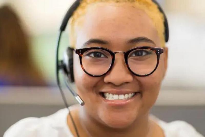 Woman wearing a headset and glasses
